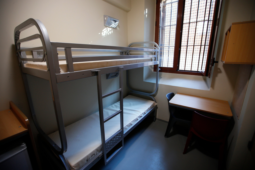 FILE - View of a cell in La Sante prison during a press visit after a four-year renovation project in Paris, Friday, April 12, 2019. (AP Photo/Francois Mori, File)