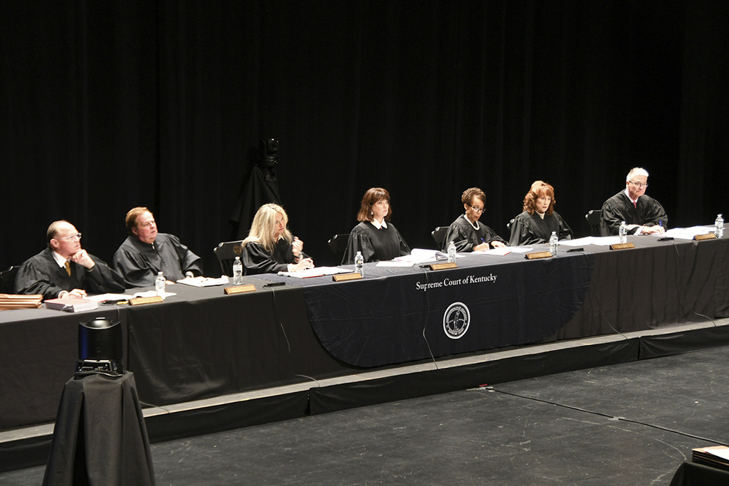 The Kentucky Supreme Court hears oral arguments at Centre College's Norton Center for the Arts in Danville, Ky., Sept. 10, 2025. Seated from left are Justice Shea Nickell, Justice Kelly Thompson, Justice Angela McCormick Bisig, Chief Justice of the Commonwealth Debra Hembree Lambert, Justice Pamela R. Goodwine, Justice Michelle M. Keller and Justice Robert B. Conley. (Jim Hoffman/Administrative Office of the Courts via AP)