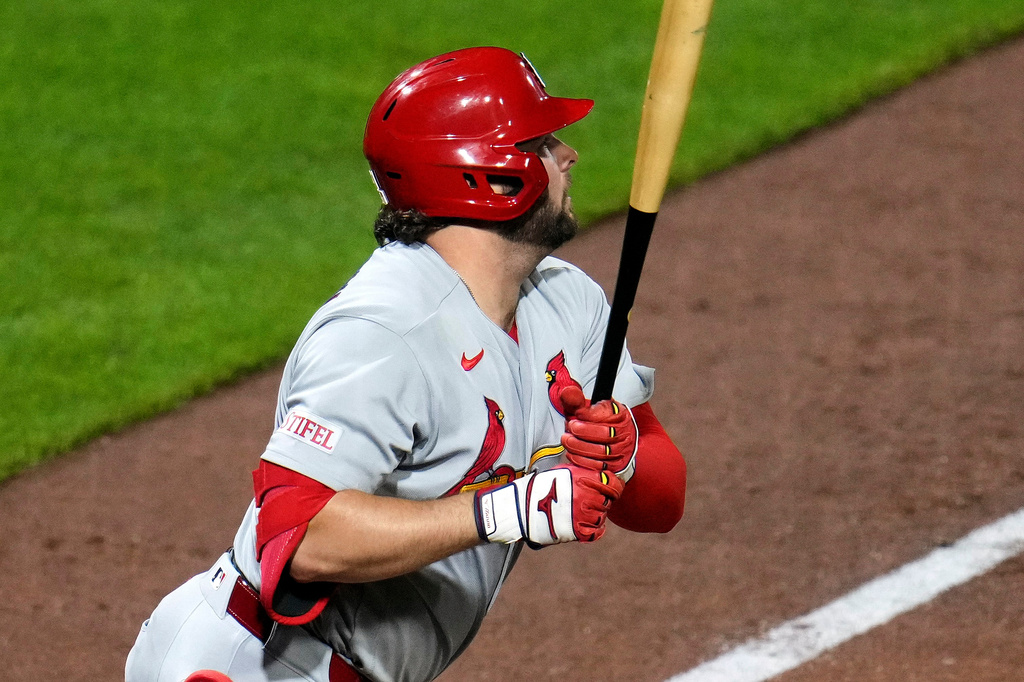 St. Louis Cardinals' Alec Burleson doubles off Pittsburgh Pirates pitcher Hunter Barco, driving in two runs during the eighth inning of a baseball game in Pittsburgh, Thursday, April 28, 2026. (AP Photo/Gene J. Puskar)