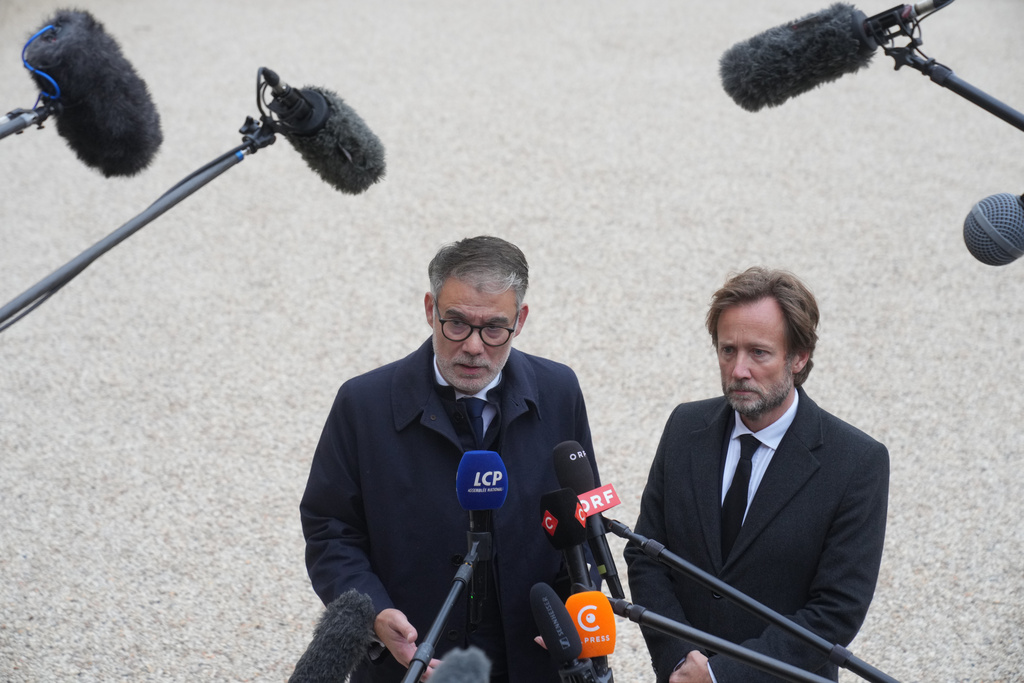 French socialist party secretary general Olivier Faure, left, and Boris Vallaud, president of the socialist parliament members at the National Assembly speak to medias after a meeting with French president Emmanuel Macron at the Elysee Palace, in Paris, Friday, Oct. 10, 2025. (AP Photo/Thibault Camus)