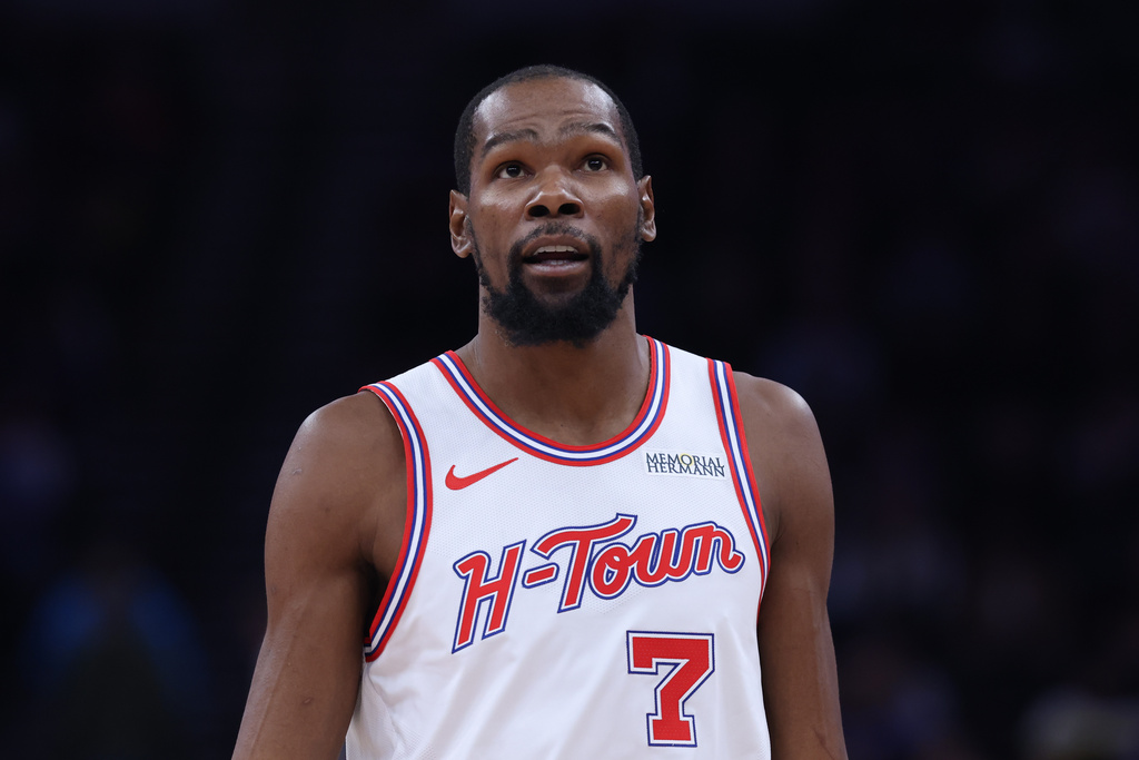 Houston Rockets forward Kevin Durant reacts after a play against the Utah Jazz during the first half of an NBA basketball game Monday, Dec. 1, 2025, in Salt Lake City. (AP Photo/Rob Gray)
