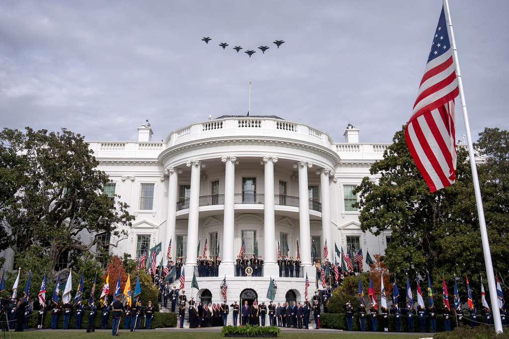 Military jets fly over the White House as President Donald Trump welcomes Saudi Arabia's Crown Prince Mohammed bin Salman, Tuesday, Nov. 18, 2025, in Washington. (AP Photo/Mark Schiefelbein)