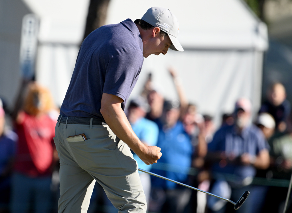 Matt Fitzpatrick celebrates his birdie putt on the 18th hole during the final round of the Valspar Championship golf tournament Sunday, March 22, 2026, in Palm Harbor, Fla. (AP Photo/Jason Behnken)