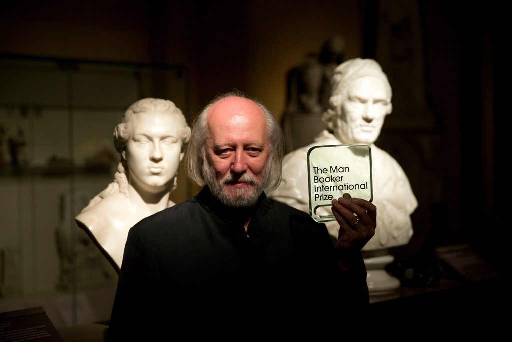 FILE - Hungary's Laszlo Krasznahorkai poses for photographers in London, Tuesday, May 19, 2015. (AP Photo/Matt Dunham, File)