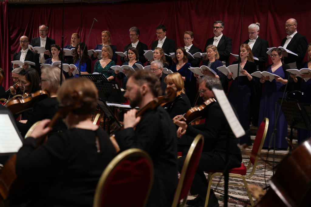 The Sixteen perform Angels Unawares by James MacMillan and conducted by Harry Christophers in the Sistine Chapel at the Vatican, Sunday, March 22, 2026. (AP Photo/Domenico Stinellis)