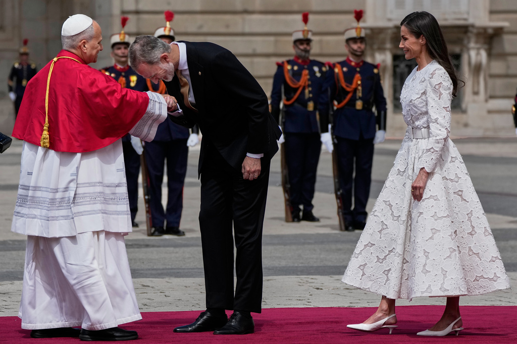 Pope Leo XIV is welcomed by Spain's King Felipe VI and Queen Letizia, as he arrives at the Royal Palace in Madrid, Saturday, June 6, 2026, on the first day of his seven-day apostolic journey to mainland Spain and the Canary Islands. (AP Photo/Alessandra Tarantino)