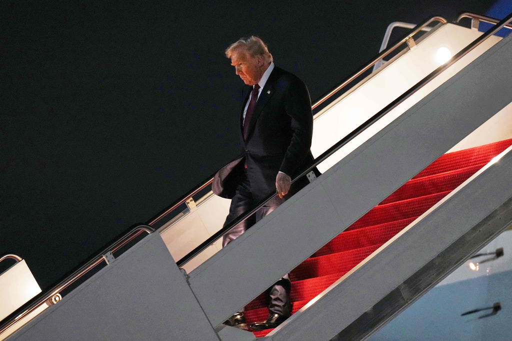 President Donald Trump walks off Air Force One, Wednesday, Nov. 5, 2025, at Joint Base Andrews, Md., after a day trip to Miami. (AP Photo/Jacquelyn Martin)