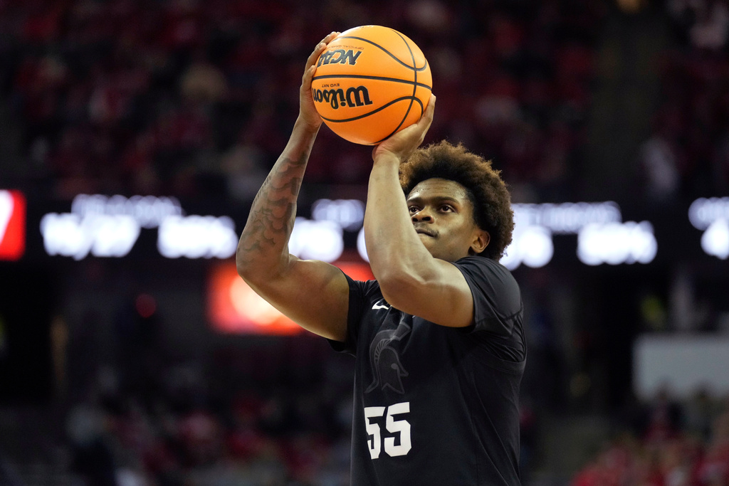 Michigan State forward Coen Carr scores a free throw during the first half of an NCAA college basketball game against Wisconsin, Friday, Feb. 13, 2026, in Madison, Wis. (AP Photo/Kayla Wolf)