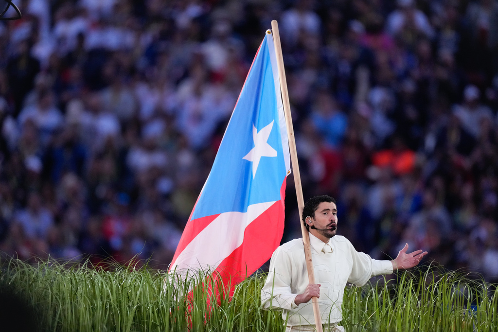 Bad Bunny performs during halftime of the NFL Super Bowl 60 football game between the New England Patriots and the Seattle Seahawks, Sunday, Feb. 8, 2026, in Santa Clara, Calif. (AP Photo/Mark J. Terrill)