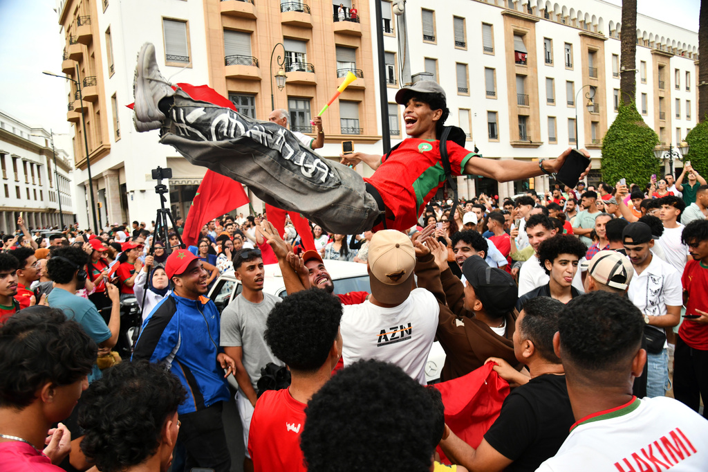 Fans celebrate after Morocco defeated Canada in a World Cup round of 16 soccer match, in Rabat Saturday, July 4, 2026. (AP Photo)