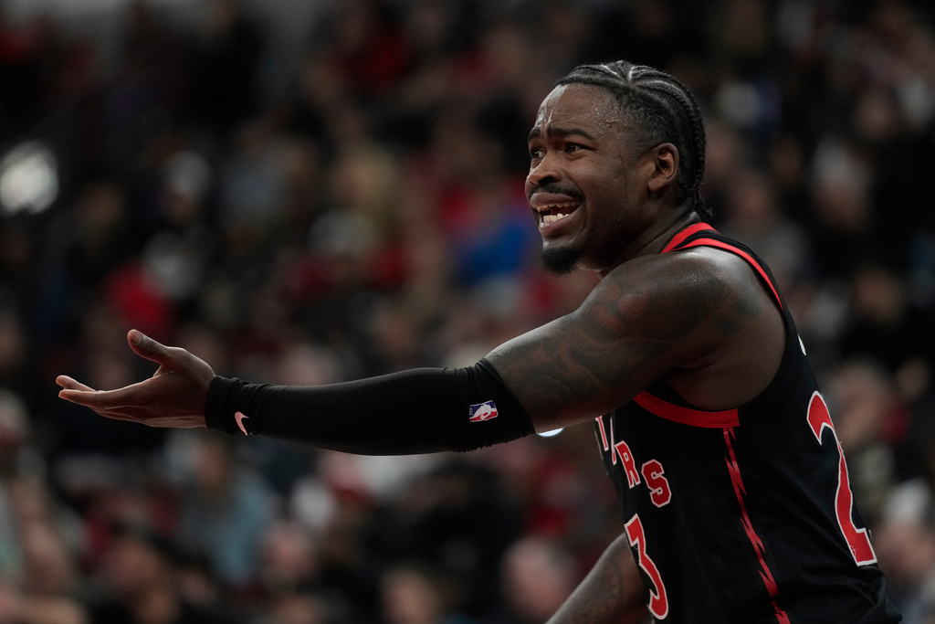 Toronto Raptors guard Jamal Shead reacts to a foul called against him during the first half of an NBA basketball game against the Chicago Bulls, Thursday, Feb. 19, 2026, in Chicago. (AP Photo/Erin Hooley)