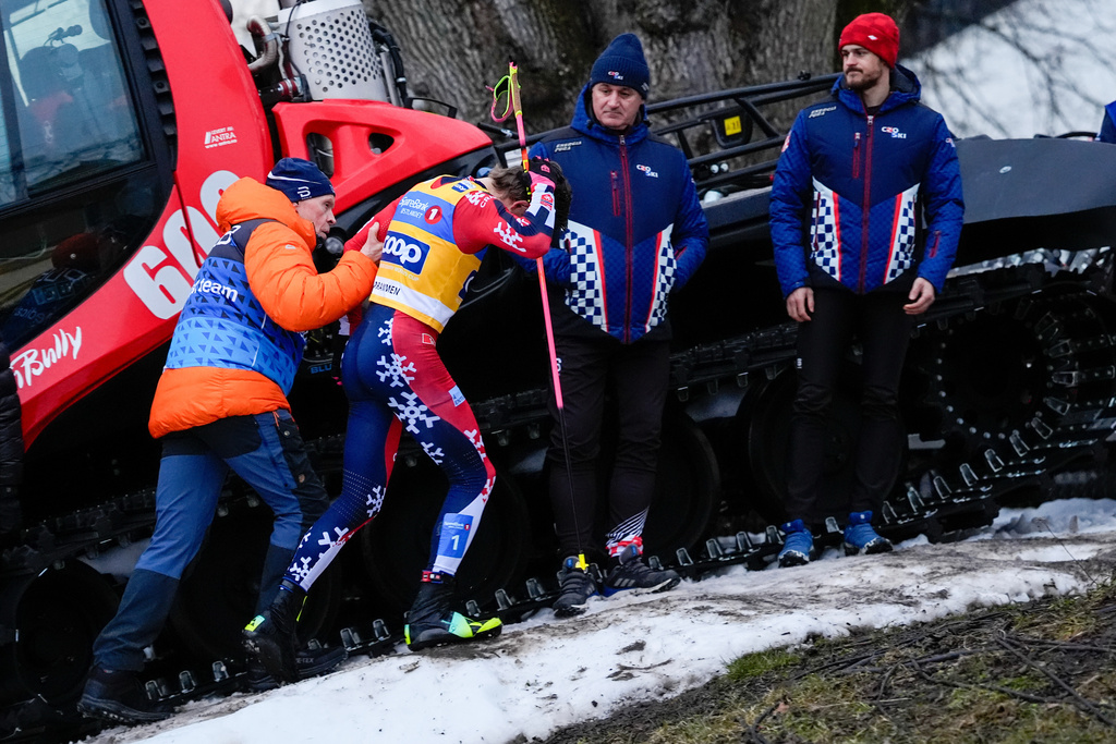 Norway's Johannes Hoesflot Klaebo, second from left, reacts after a fall during the World Cup sprint cross-country race in Drammen, Norway, Thursday March 12, 2026. (Lise Aserud/NTB Scanpix via AP)