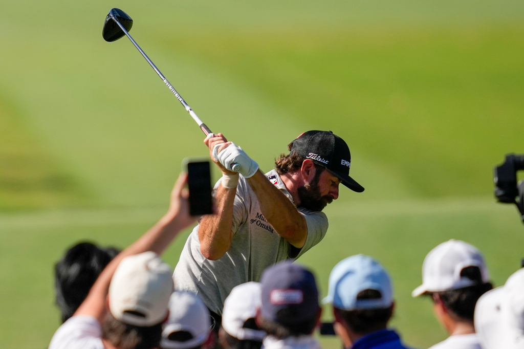 Cameron Young hits from the 12th tee during the second round of the Cadillac Championship PGA golf tournament Friday, May 1, 2026, in Doral, Fla. (AP Photo/David J. Phillip)