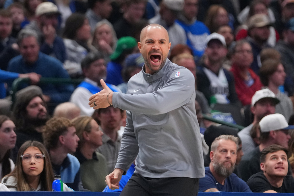 Brooklyn Nets head coach Jordi Fernandez talks to his team during the first half of an NBA basketball game against the Dallas Mavericks Monday, Jan. 12, 2026, in Dallas. (AP Photo/Julio Cortez)