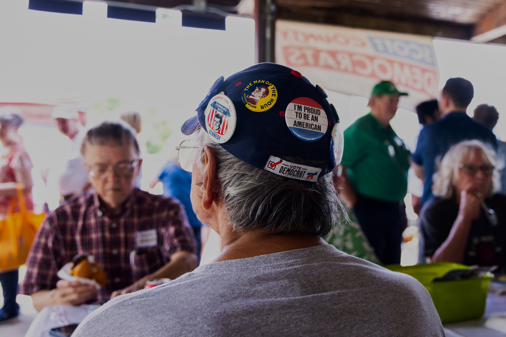 People attend the Scott County Democrats Annual Family Picnic in Bettendorf, Iowa, Sunday, Aug. 16, 2026. (AP Photo/Joseph Cress)