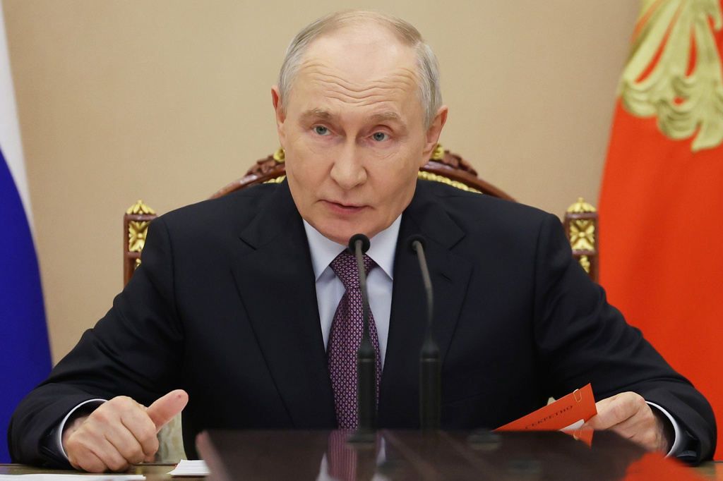 Russian President Vladimir Putin holds the Security Council meeting in Moscow, Friday, Aug. 7, 2026. (Alexander Kazakov, Sputnik, Kremlin Pool Photo via AP)