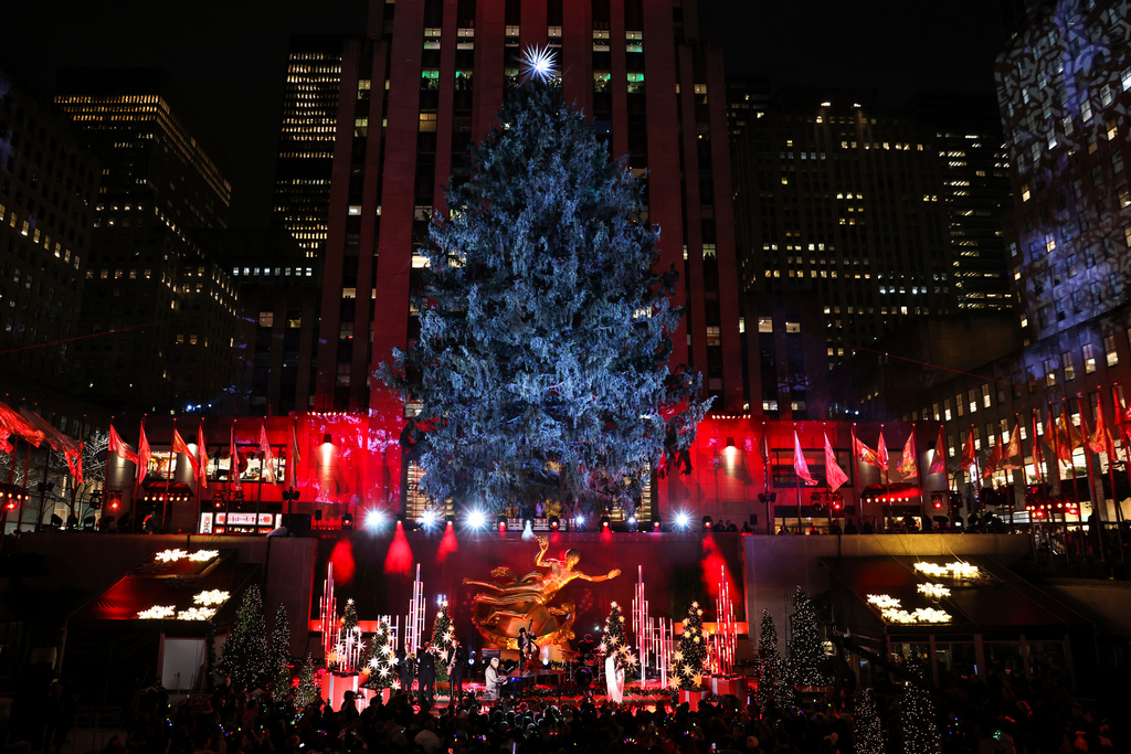 FILE - Katherine McPhee and David Foster perform during the 90th annual Rockefeller Center Christmas tree lighting ceremony, Wednesday, Nov. 30, 2022, in New York. (AP Photo/Julia Nikhinson, File)