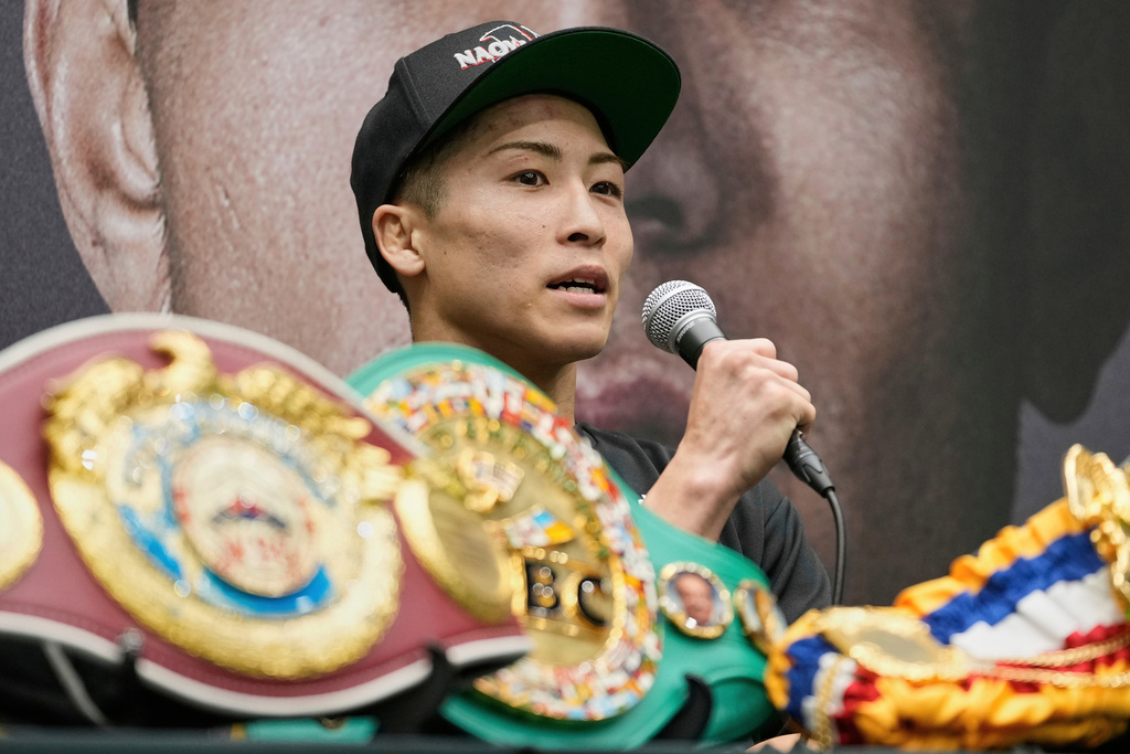 FILE - Japanese champion Naoya Inoue speaks during a press conference after winning over Uzbekistan's Murodjon Akhmadaliev in a boxing match for the unified WBC IBF WBO WBA super bantamweight world title in Nagoya, Japan, Sunday, Sept. 14, 2025.(AP Photo/Shuji Kajiyama, File)