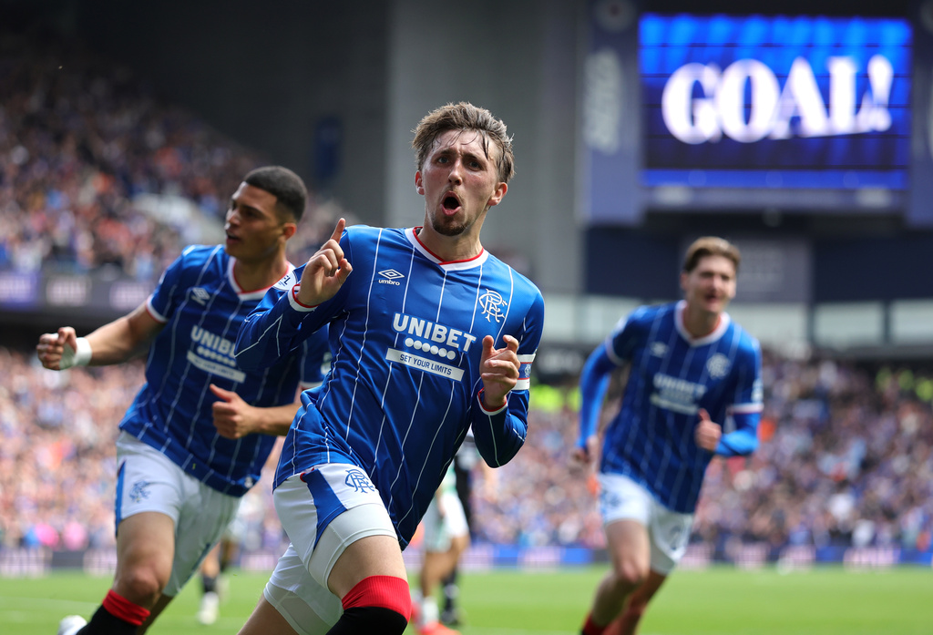Rangers' Daniel Neil celebrates scoring their side's first goal during the Scottish League Cup soccer match between Rangers and Celtic, in Glasgow, Sunday Sept. 13, 2026. (Steve Welsh/PA via AP)
