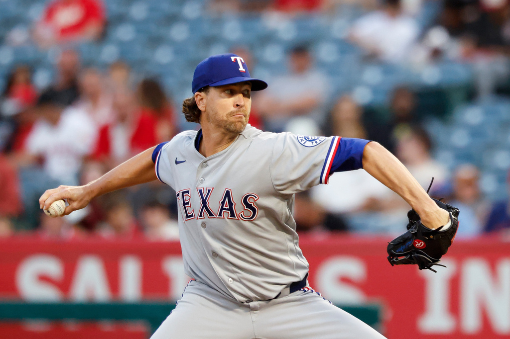 Texas Rangers starting pitcher Jacob Degrom (48) throws during the first inning of a baseball game against the Los Angeles Angels, Thursday, Aug. 13, 2026, in Anaheim, Calif. (AP Photo/Caroline Brehman)
