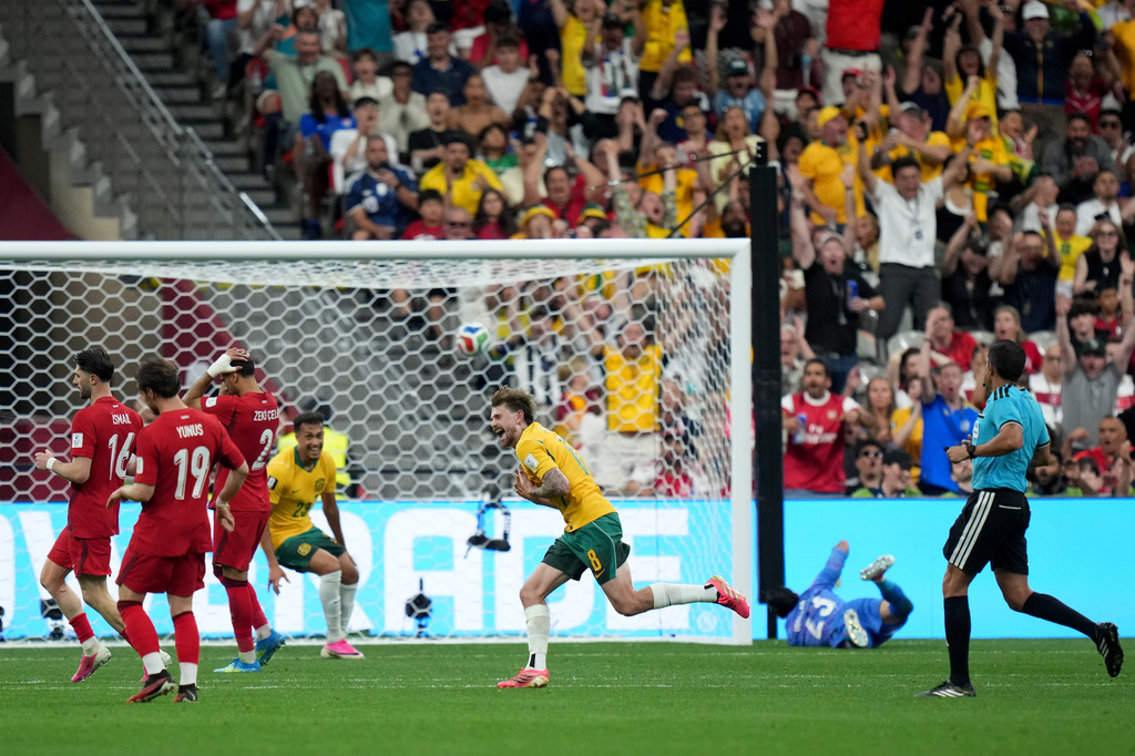 Australia's Conor Metcalfe celebrates scoring a goal, during the World Cup Group D soccer match between Australia and Turkey in Vancouver, Canada, Saturday, June 13, 2026. (Darryl Dyck/The Canadian Press via AP)