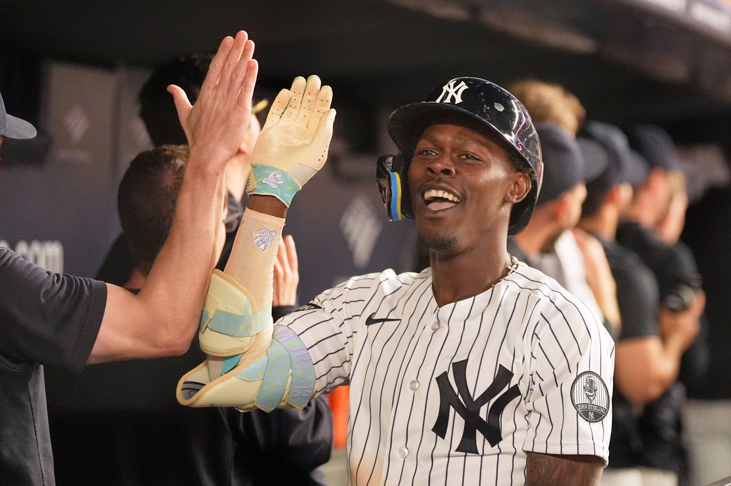 New York Yankees' Jazz Chisholm Jr. celebrates his two-run home run in the dugout during the seventh inning of a baseball game against the Toronto Blue Jays, Monday, May 18, 2026, in New York. (AP Photo/Seth Wenig)