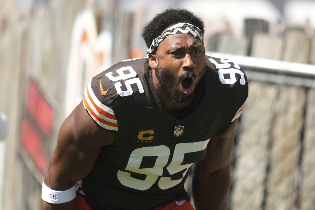 Cleveland Browns defensive end Myles Garrett (95) enters the field before an NFL football game against the Cincinnati Bengals, Sunday, Sept. 7, 2025, in Cleveland. (AP Photo/Sue Ogrocki)