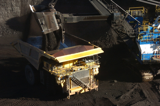 A mechanized shovel loads coal into a haul truck at the Spring Creek mine, in this Nov. 15, 2016 photo, near Decker, Mont. (AP Photo/Matthew Brown) A mechanized shovel loads coal into a haul truck at the Spring Creek mine, in this Nov. 15, 2016 photo, near Decker, Mont. (AP Photo/Matthew Brown)