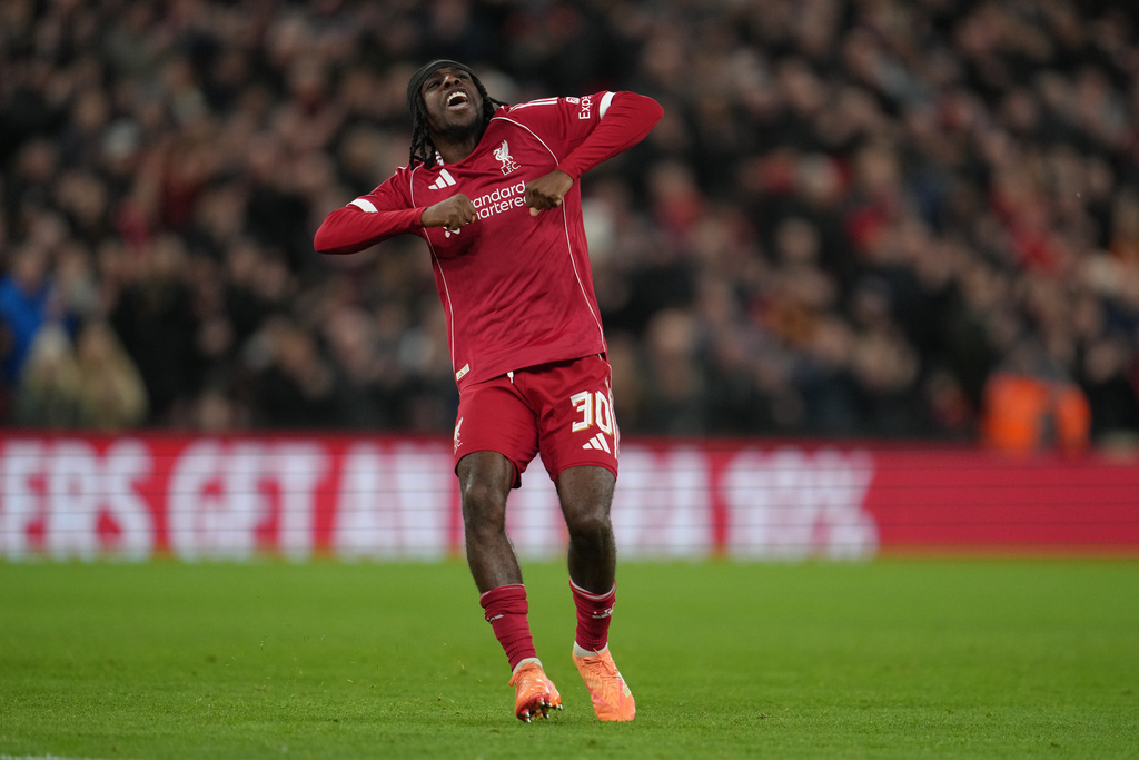 Liverpool's Jeremie Frimpong celebrates after scoring during the FA Cup third round soccer match between Liverpool and Barnsley in Liverpool, England, Monday, Jan. 12, 2026. (AP Photo/Jon Super)