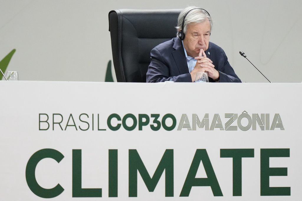 United Nations Secretary-General Antonio Guterres listens to Brazilian President Luiz Inacio Lula da Silva's speech at the COP30 U.N. Climate Summit in Belem, Brazil, Thursday, Nov. 6, 2025. (AP Photo/Fernando Llano)