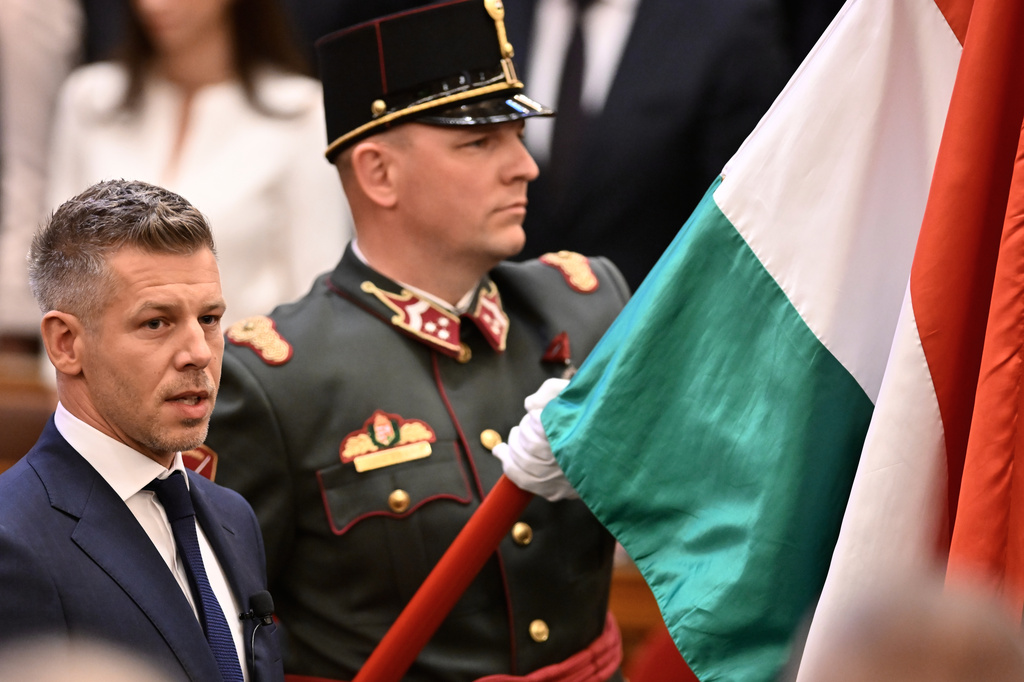 Peter Magyar takes the oath as Hungary's prime minister during a ceremony in Budapest, Hungary, Saturday, May 9, 2026. (AP Photo/Denes Erdos)