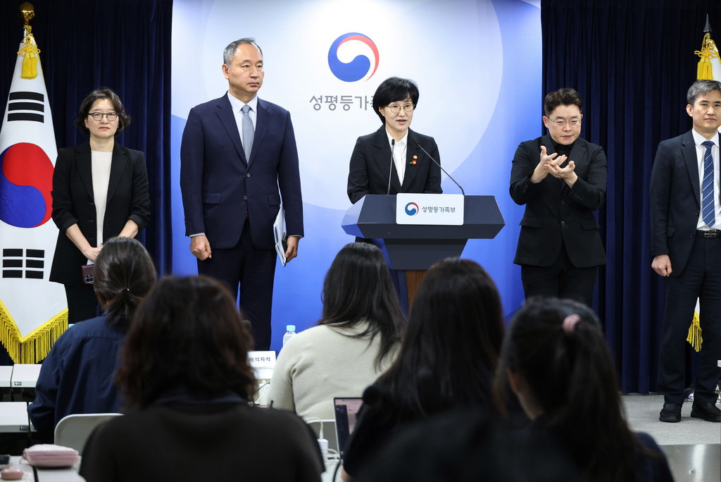 South Korean Gender Equality and Family Minister Won Min-kyong, center, speaks during a press briefing on the introduction of abortion pills at the Government Complex in Seoul, South Korea, Wednesday, Sept. 16, 2026. (Ahn Jeong-won/Yonhap via AP)
