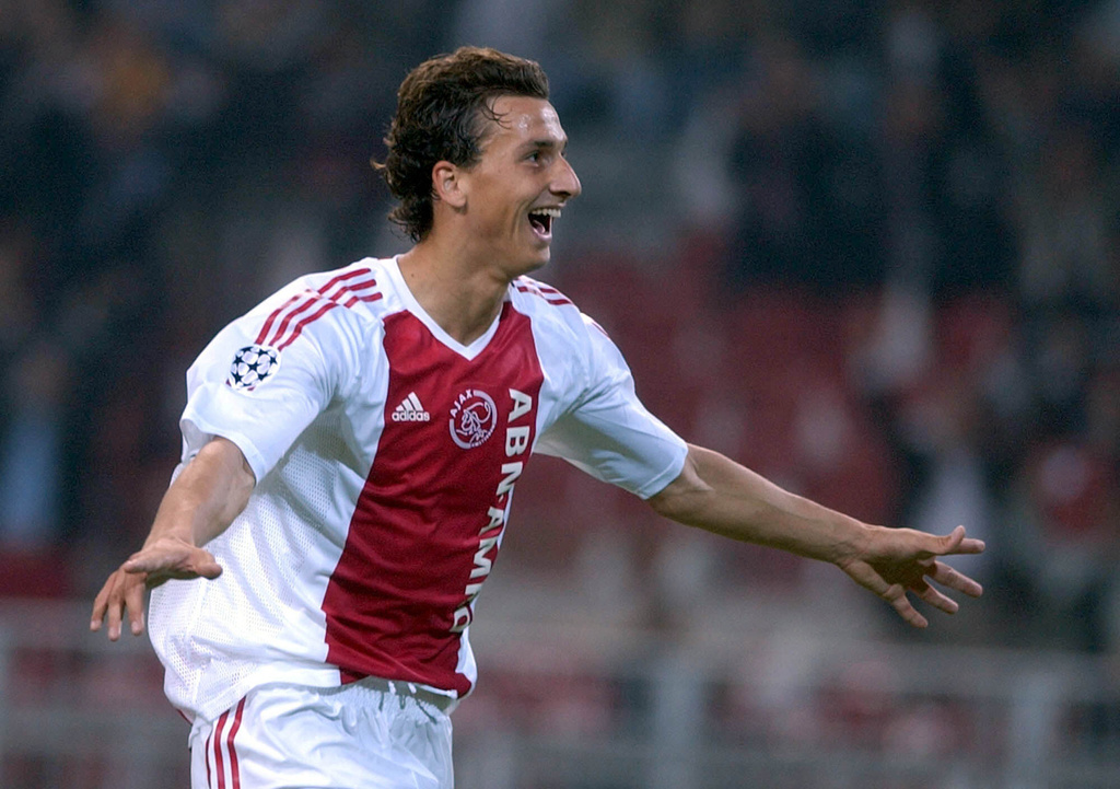 FILE - Sweden's striker Zlatan Ibrahimovic of Ajax Amsterdam celebrates after he scored his and his team's second goal against Olympique Lyonnaise during their Champions League match in Amsterdam Tuesday, Sept. 17, 2002. (AP Photo/Dusan Vranic, file)