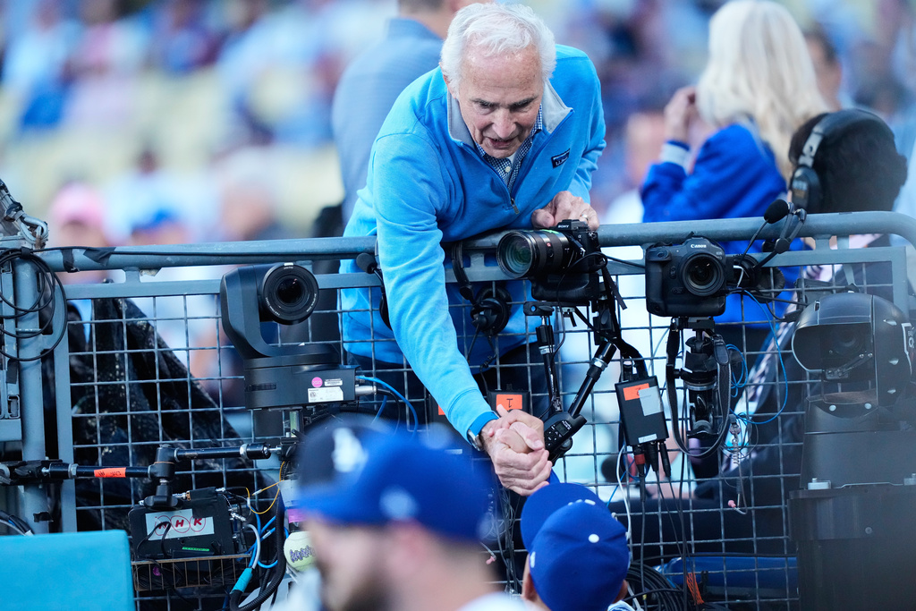 Sandy Koufax shakes hand with Los Angeles Dodgers manager Dave Roberts before Game 3 of baseball's National League Division Series between the Los Angeles Dodgers and the Philadelphia Phillies, Wednesday, Oct. 8, 2025, in Los Angeles. (AP Photo/Mark J. Terrill)