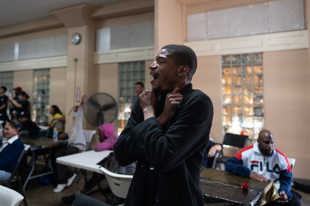 DeAndre Owens reacts as he watches a contestant perform during Skid Row's inaugural talent show in downtown Los Angeles, Saturday, Sept. 19, 2026. (AP Photo/Jae C. Hong)