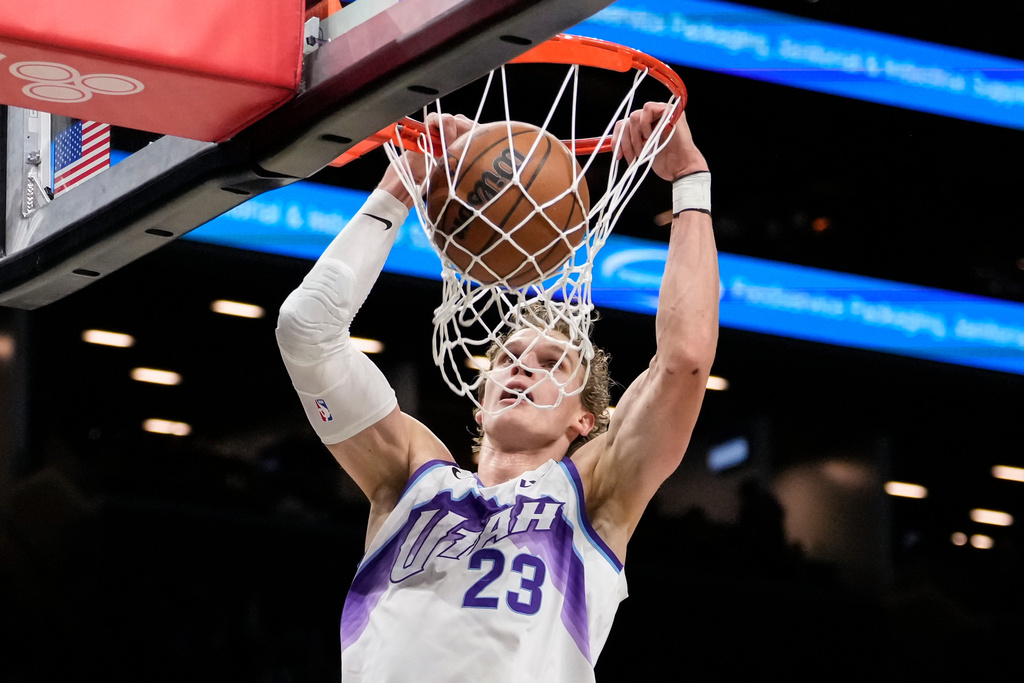 Utah Jazz forward Lauri Markkanen (23) dunks during the first half of an NBA basketball game against the Brooklyn Nets, Thursday, Dec. 4, 2025, in New York. (AP Photo/Yuki Iwamura)