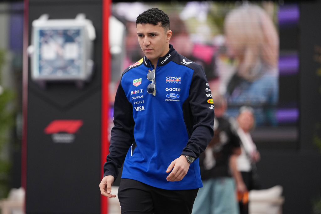 Red Bull driver Isack Hadjar of France arrives at the track ahead of the first practice session for the Australian Formula One Grand Prix at Albert Park, in Melbourne, Australia, Friday, March 6, 2026. (AP Photo/Asanka Brendon Ratnayake)