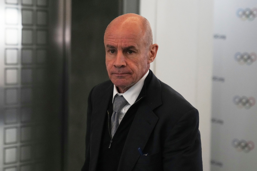 FILE - Candidate to the presidency of the International Olympic Committee Johan Eliasch arrives at the mixed zone during a break of the 144th session, which will elect the new IOC President, in Costa Navarino, western Greece, March 19, 2025. (AP Photo/Thanassis Stavrakis, File)