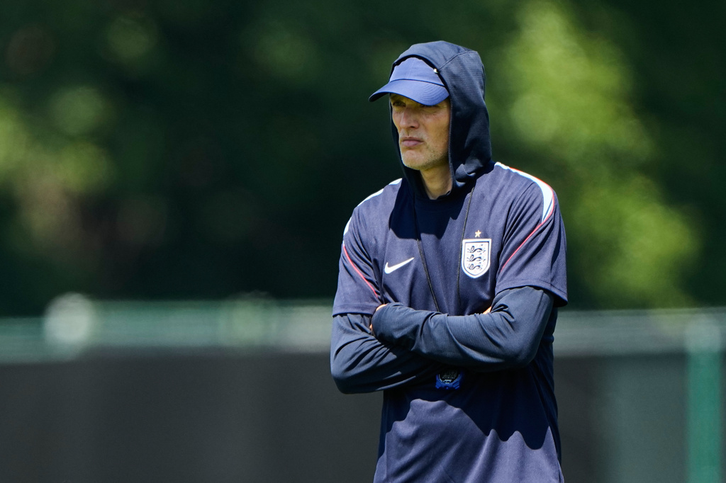 England head coach Thomas Tuchel watches training for the World Cup soccer tournament Tuesday, July 14, 2026, in Kansas City, Mo. (AP Photo/Charlie Riedel)
