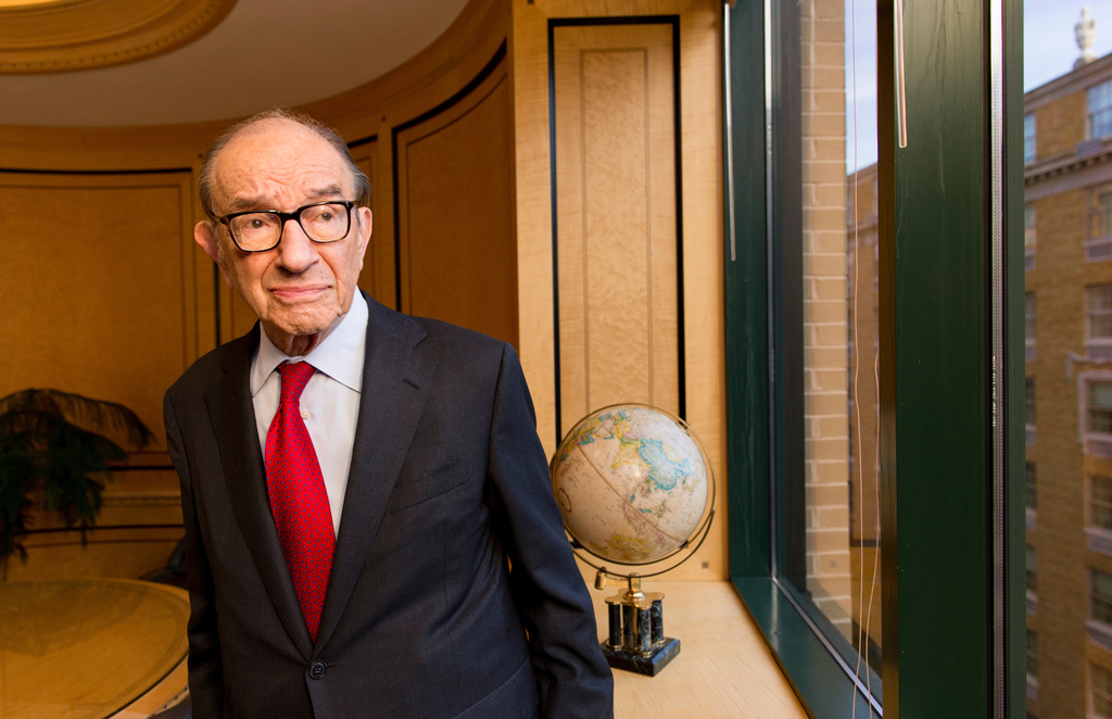 FILE - Economist Alan Greenspan, chairman of the Federal Reserve from 1987 to 2006, is seen in his office in Washington, Oct. 18, 2013. (AP Photo/J. Scott Applewhite, File)