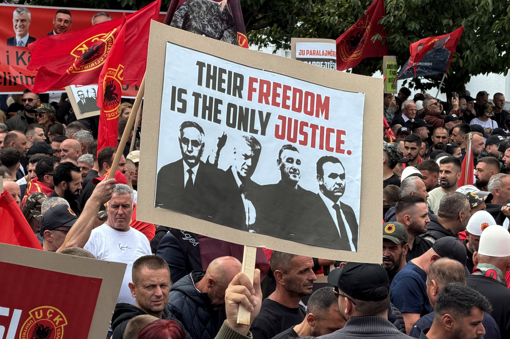 People rally in Pristina, Kosovo, Saturday, Sept. 12, 2026, in support of the former president Hashim Thaci and the other defendants, Kadri Veseli, Rexhep Selimi and Jakup Krasniqi ahead of their verdicts next week at a Netherlands-based court which tried them for alleged war crimes during a 1998-1999 separatist war from Serbia. (AP Photo/Zana Cimili)
