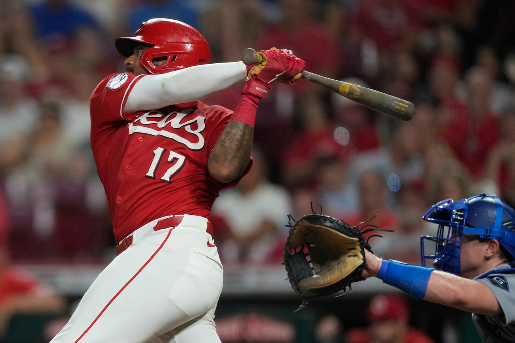 Cincinnati Reds' Dane Myers, left, watches his solo home run as Los Angeles Dodgers catcher Will Smith is at right, during the fifth inning of a baseball game, Wednesday, Sept. 16, 2026, in Cincinnati. (AP Photo/Carolyn Kaster)