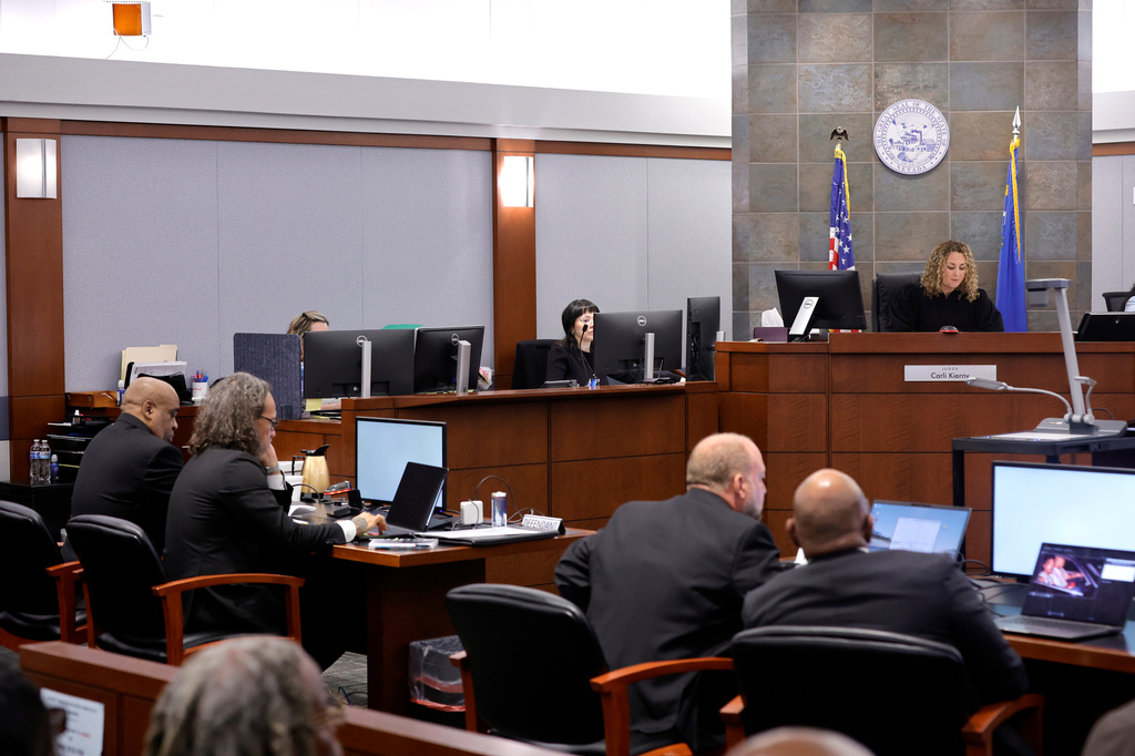District Court Judge Carli Kierny, top right, reads jury instructions before closing arguments in the Duane Davis murder trial, related to the 1996 killing of rapper Tupac Shakur, in Clark County District Court at the Regional Justice Center in Las Vegas, Monday, Aug. 31, 2026. (Steve Marcus/Pool Photo via AP)
