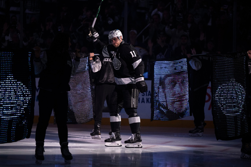 Los Angeles Kings center Anze Kopitar (11) is introduced before an NHL hockey game against Colorado Avalanche, Tuesday, Oct. 7, 2025, in Los Angeles. (AP Photo/Kyusung Gong)