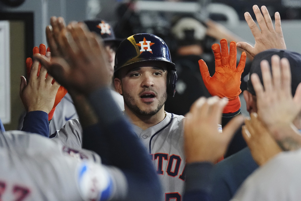 Houston Astros' Yainer Diaz celebrates his solo home run against the Toronto Blue Jays during ninth inning MLB baseball action in Toronto on Wednesday, September 10, 2025. (Nathan Denette/The Canadian Press via AP)
