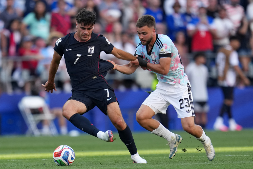 United States' Giovanni Reyna (7) controls the ball against Belgium's Nicolas Raskin (23) during the World Cup round of 16 soccer match between the United States and Belgium in Seattle, Monday, July 6, 2026. (AP Photo/Abbie Parr)