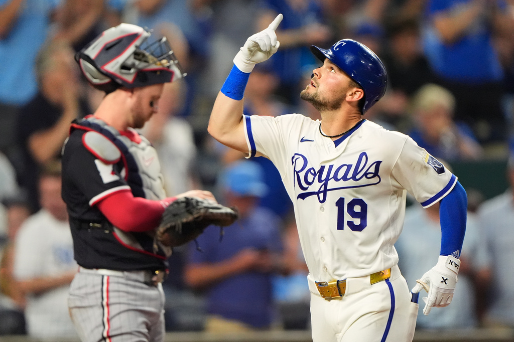 Kansas City Royals' Michael Massey (19) celebrates as he crosses the plate after hitting a solo home run during the seventh inning of a baseball game against the Minnesota Twins, Wednesday, Aug. 5, 2026, in Kansas City, Mo. (AP Photo/Charlie Riedel)