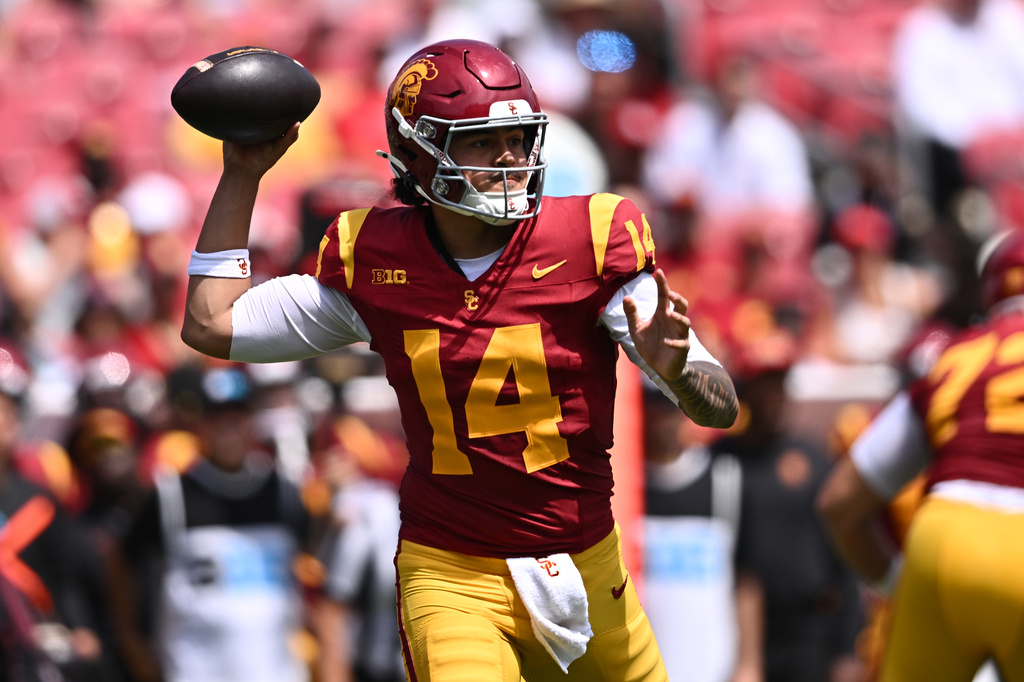 Southern California quarterback Jayden Maiava looks to throw during the first half of an NCAA college football game against San Jose State, Saturday, Aug. 29, 2026, in Los Angeles. (AP Photo/William Liang)
