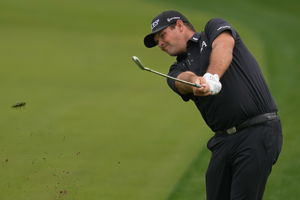 Patrick Reed of the United States plays his second shot on the 8th hole during the final round of the Dubai Desert Classic in United Arab Emirates, Sunday, Jan. 25, 2026. (AP Photo/Altaf Qadri)