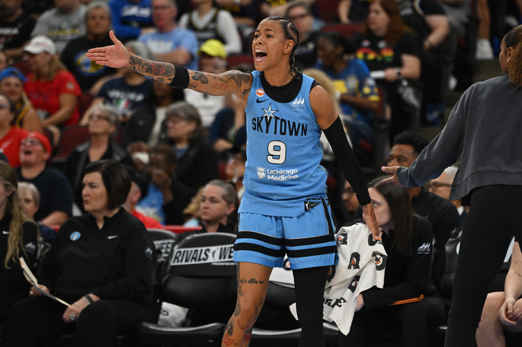 Chicago Sky's Natasha Cloud (9) yells at the referees before getting called for a technical foul during the first half half of an WNBA basketball game against the Indiana Fever in Chicago, Saturday, Aug. 8, 2026. (AP Photo/Paul Beaty)